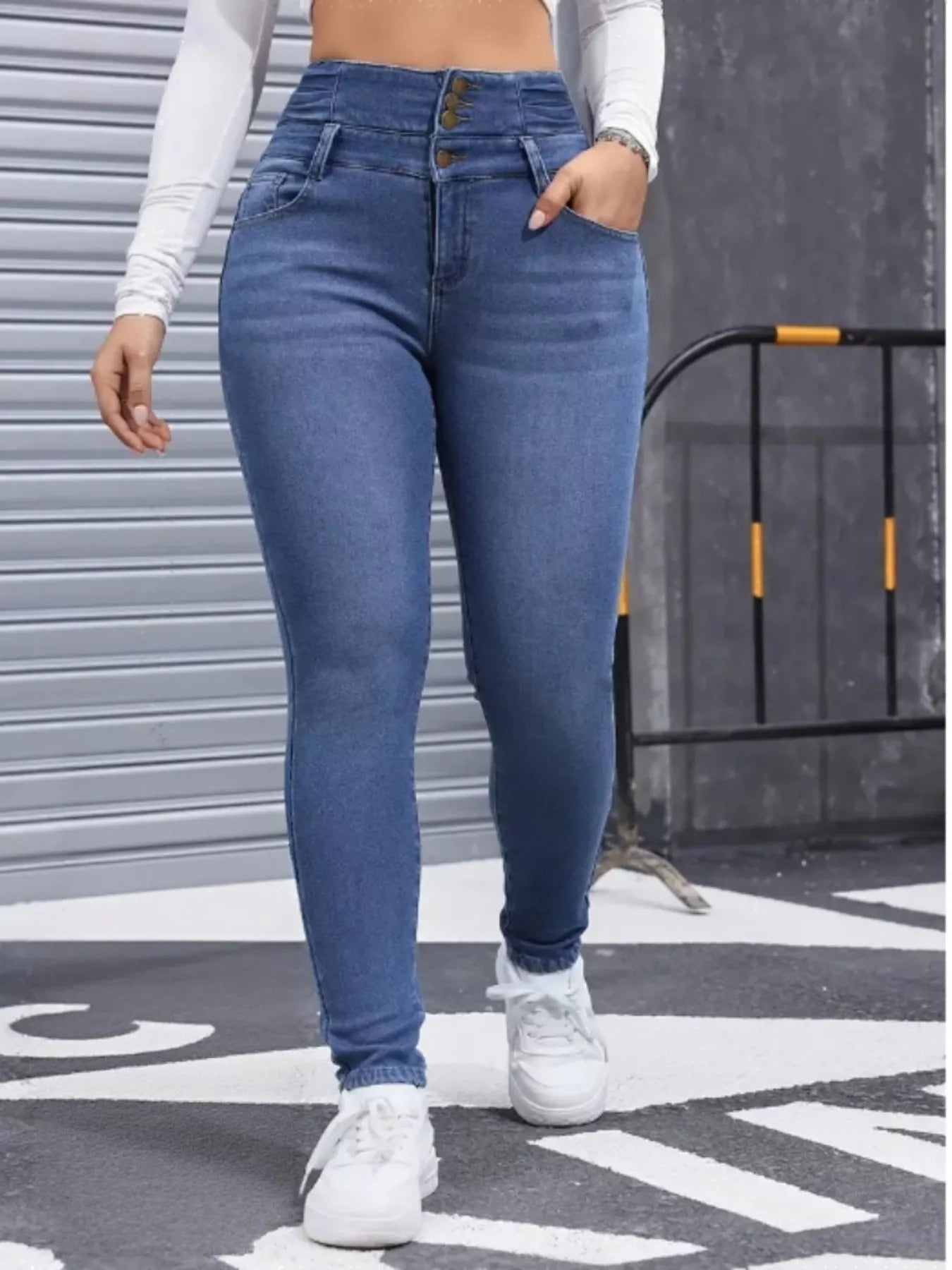 Women's high waist button fly skinny jeans front view