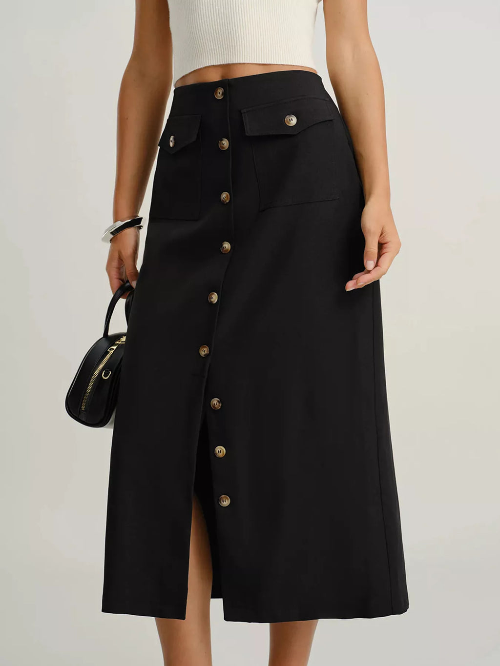 Midi skirt with button detail and slit close-up