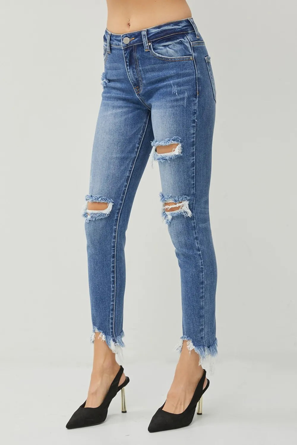 Slim jeans distressed detail and frayed hem detailed view